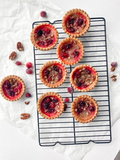 Pecan Tart Recipe with Cranberries on a cooling rack