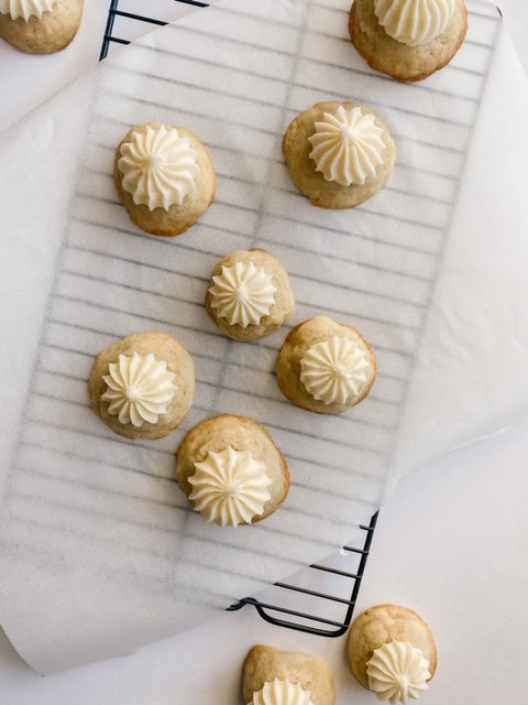 eggnog cookie recipe on parchment paper and cooling rack