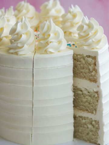 vanilla cake with slice cut out