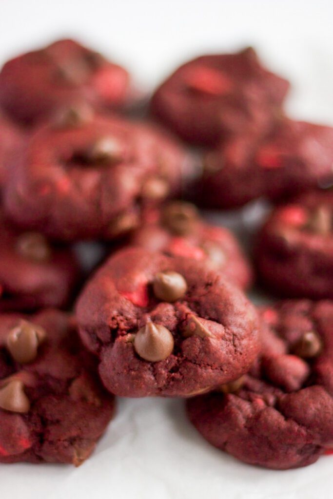 red velvet cookies sitting on a plate