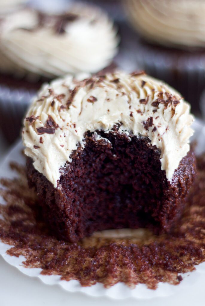 a chocolate cupcake with biscoff frosting