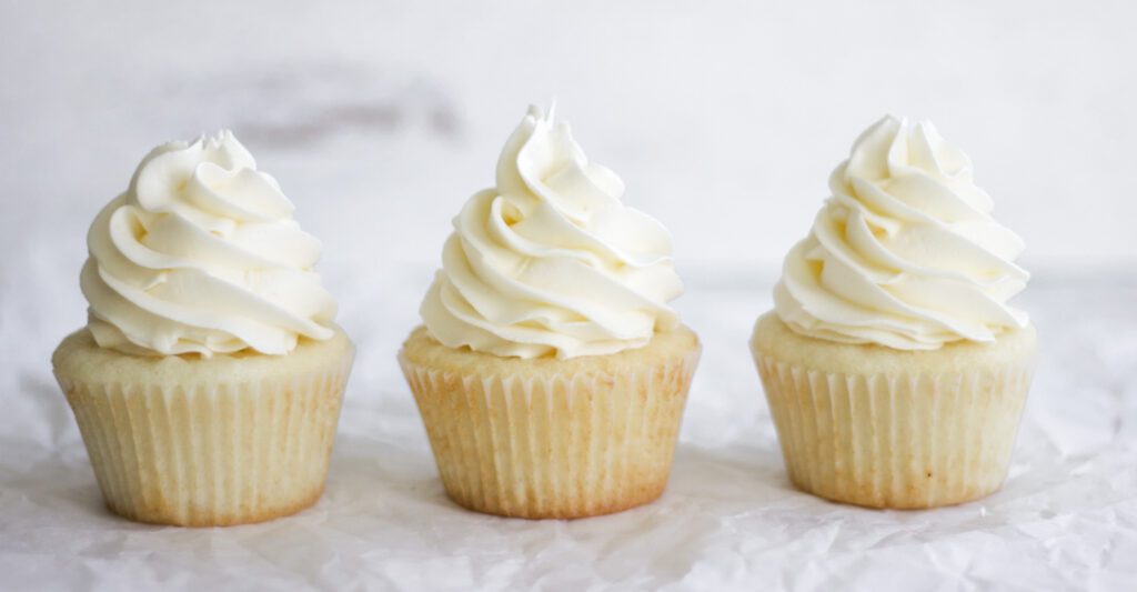 3 Vanilla Cupcakes from Scratch in a line