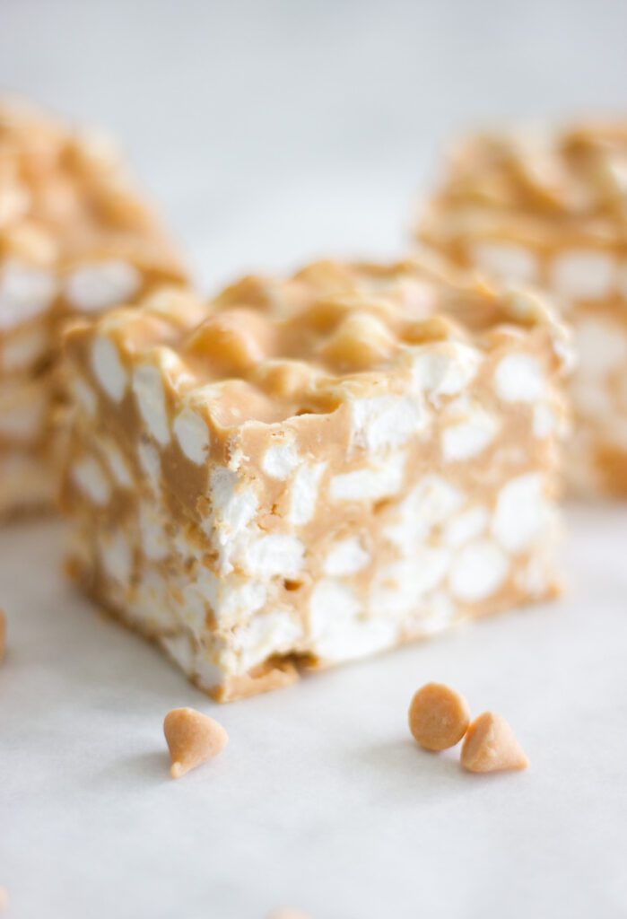 butterscotch squares with marshmallows and butterscotch chips on a table