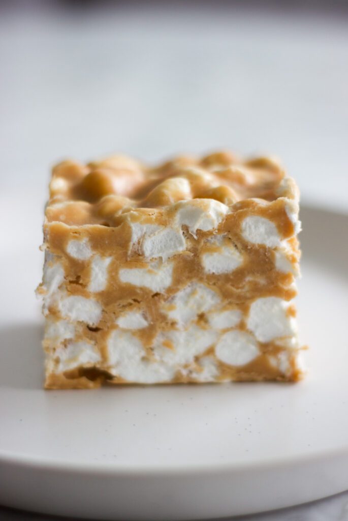 a butterscotch marshmallow square on a plate