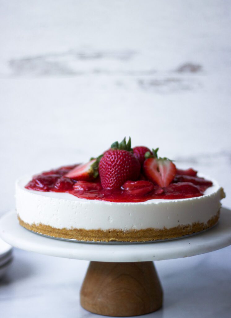 cheese cake topped with strawberries