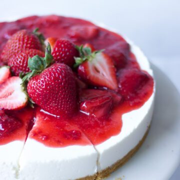cheesecake with strawberries on it