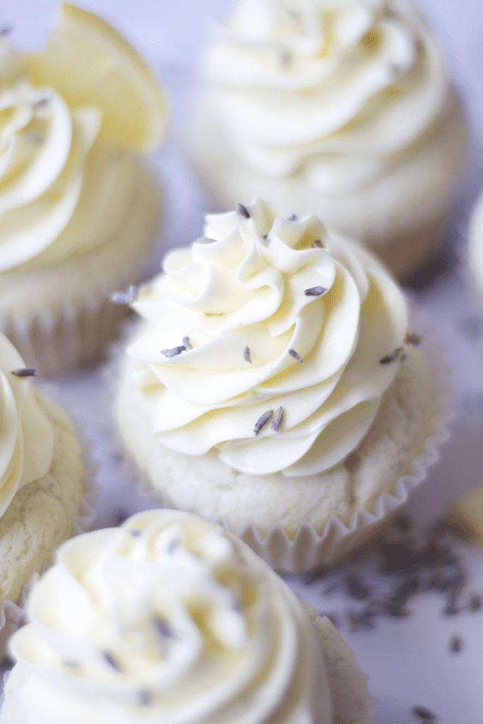 American Buttercream Frosting is the base for this lemon buttercream topped lavender cupcake.