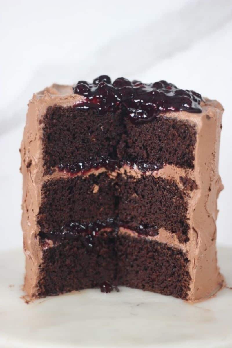 chocolate blueberry cake with slice cut out