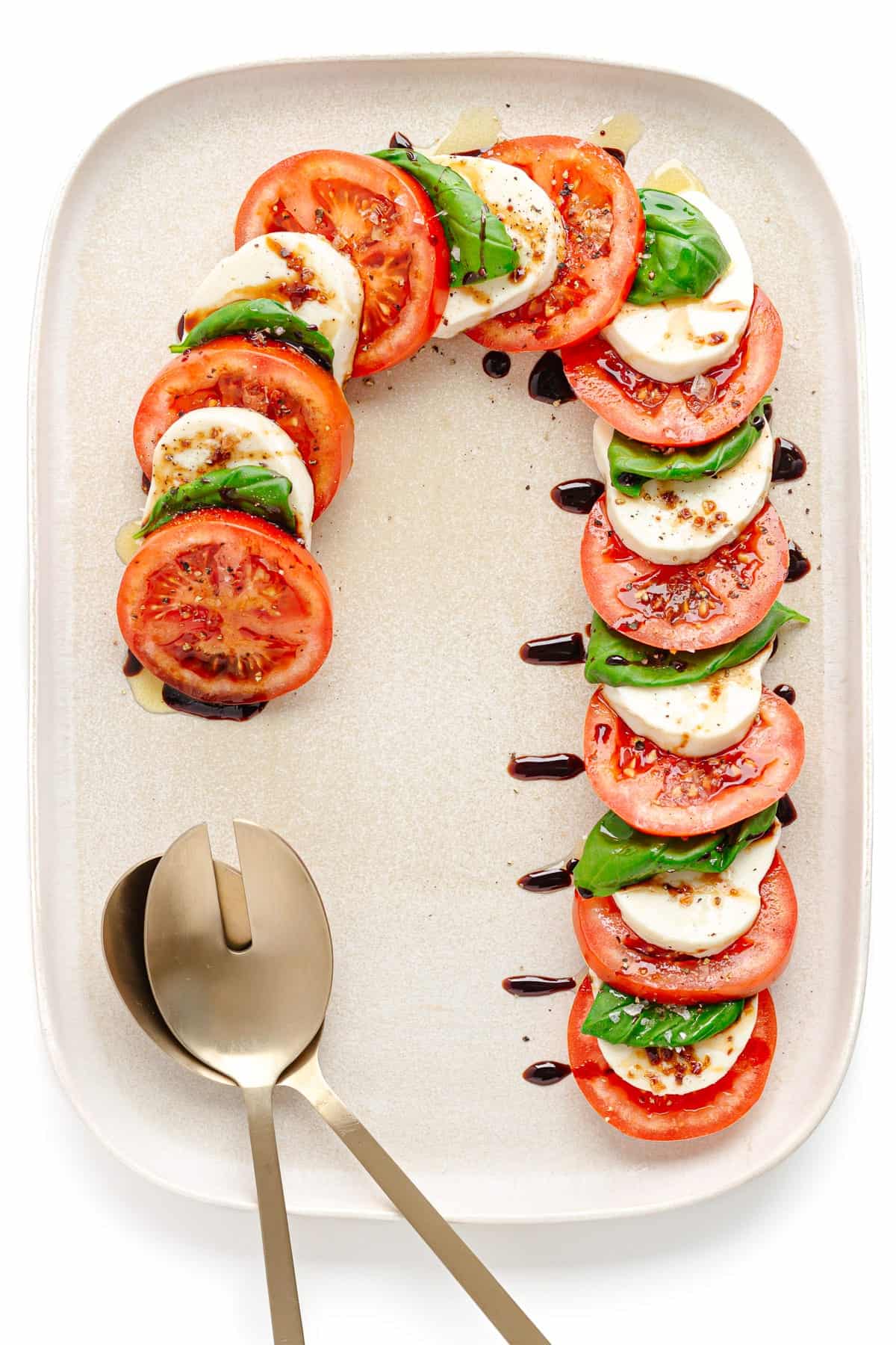 caprese salad in the shape of a candy cane