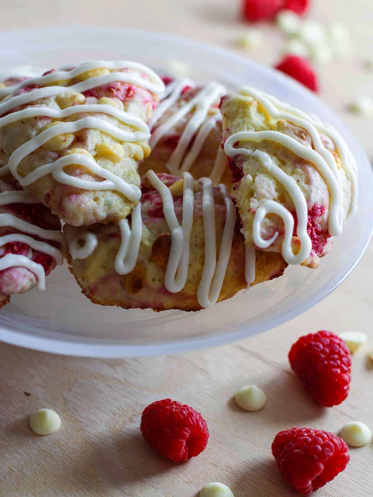 raspberry scones stacked on a plate