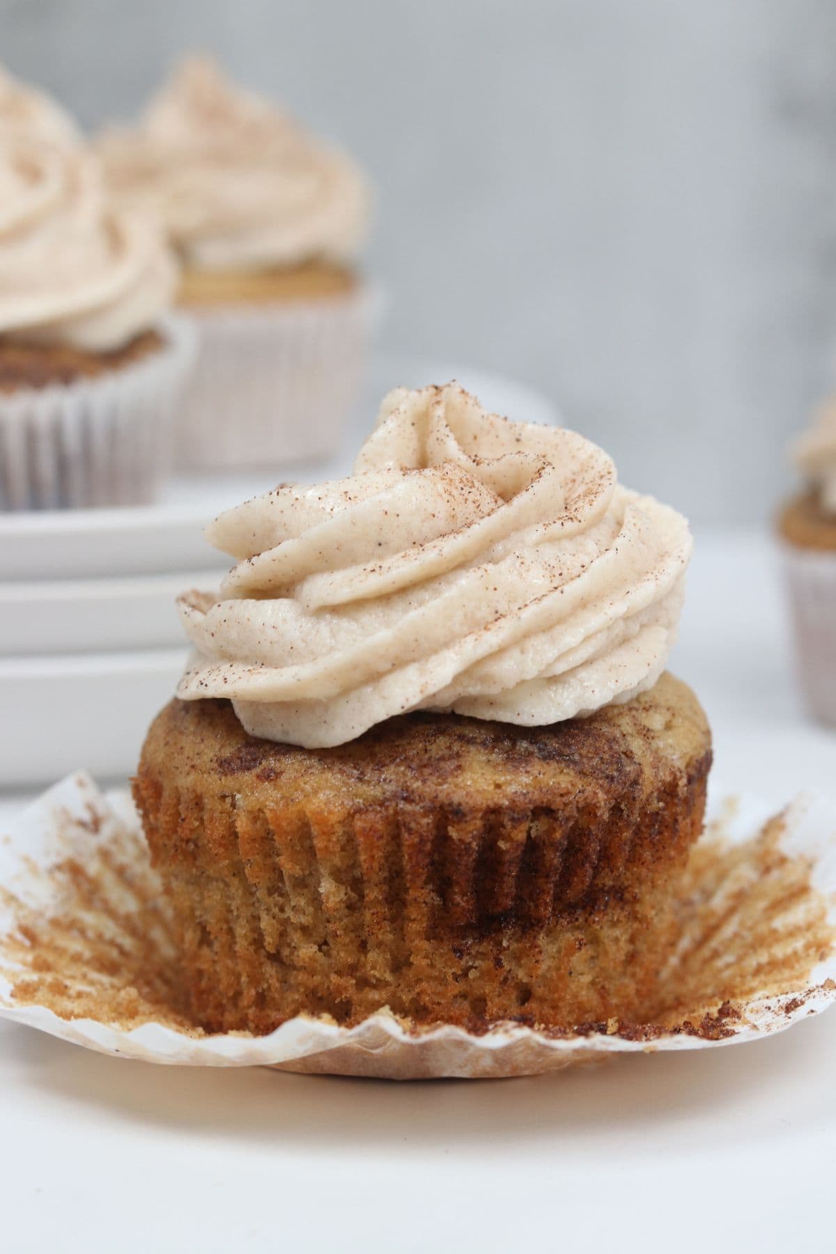 a cinnamon cupcakes with wrapper opened