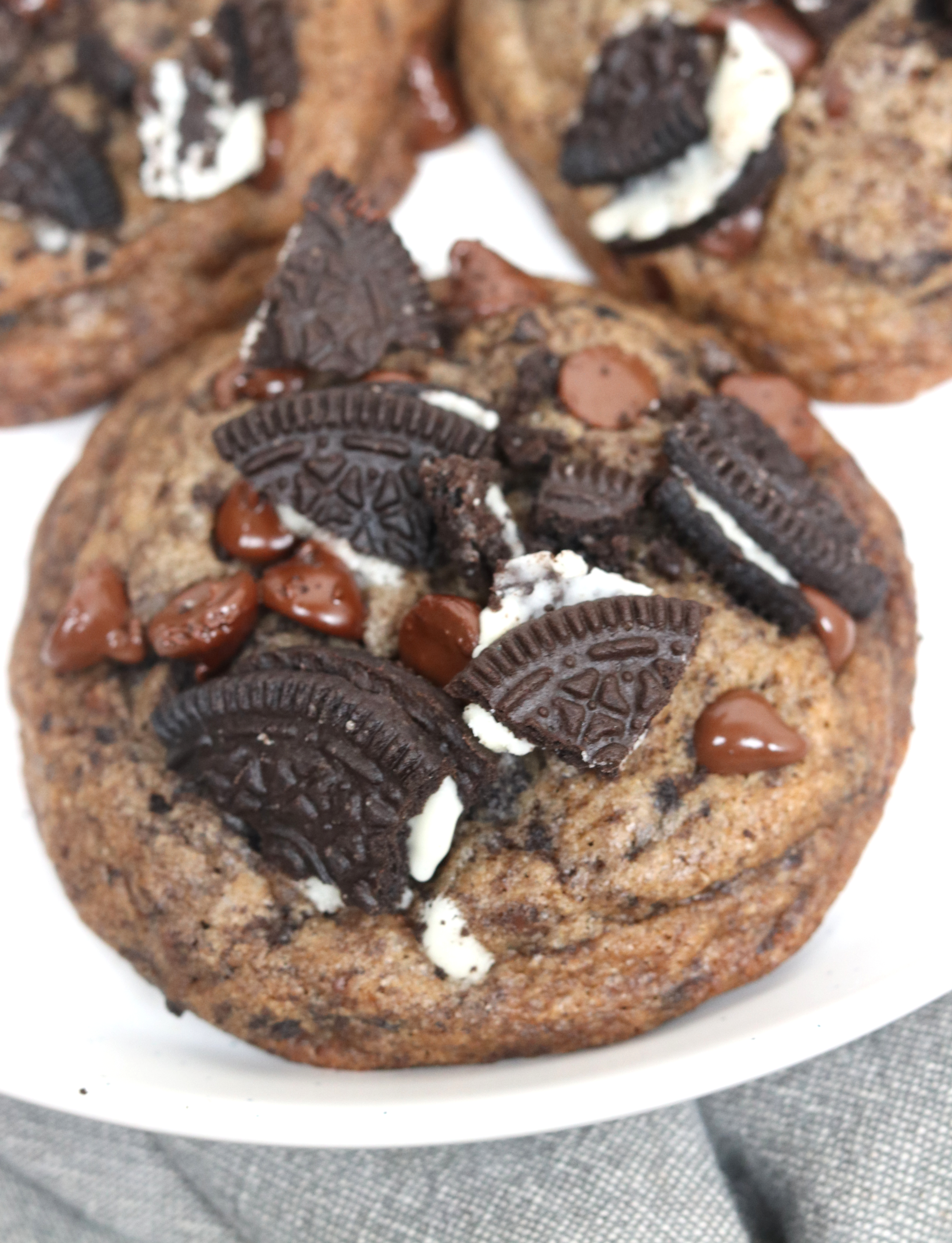 and oreo and chocolate chip cookie on a plate