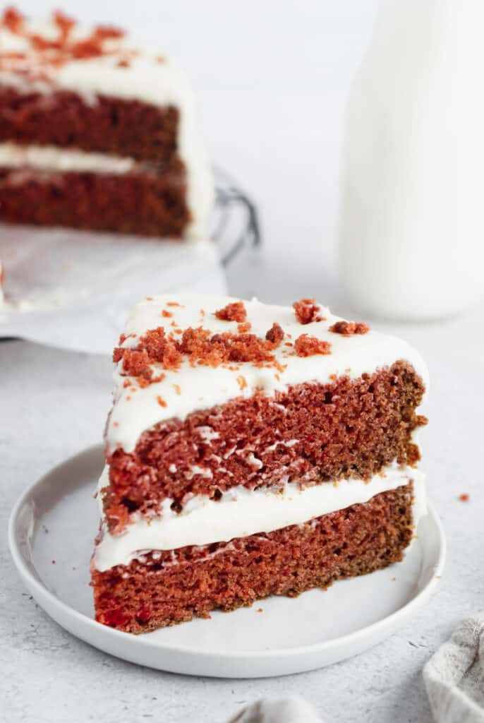 vegan red velvet cake with slice cut out