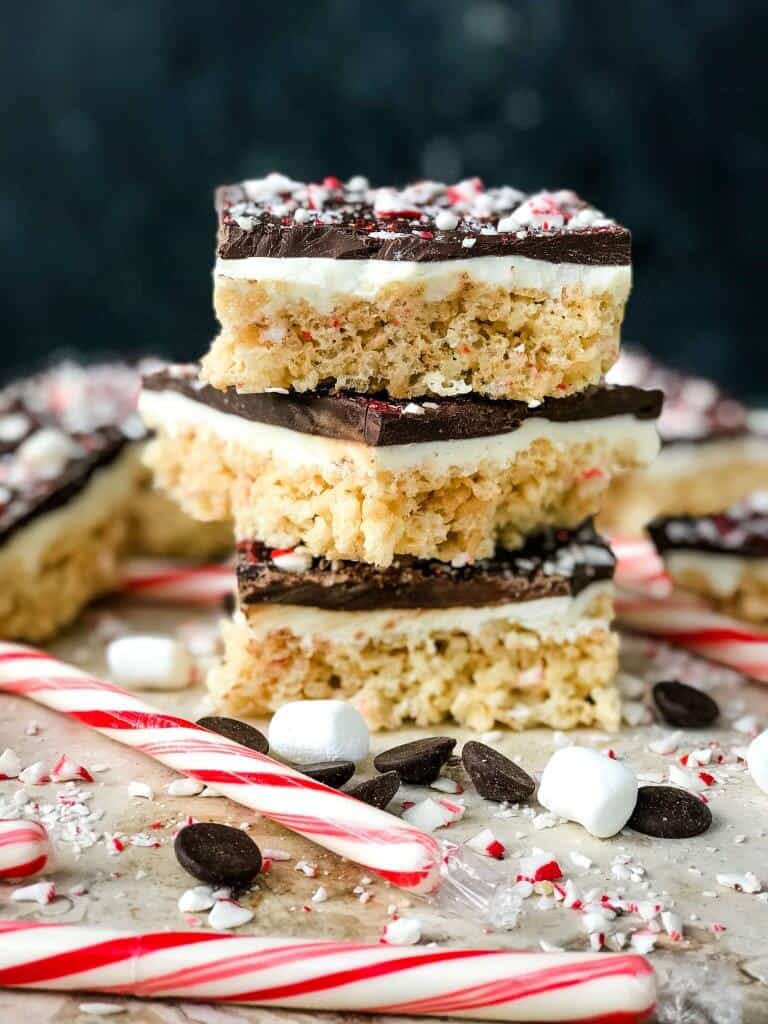peppermint christmas rice krispies stacked on a plate
