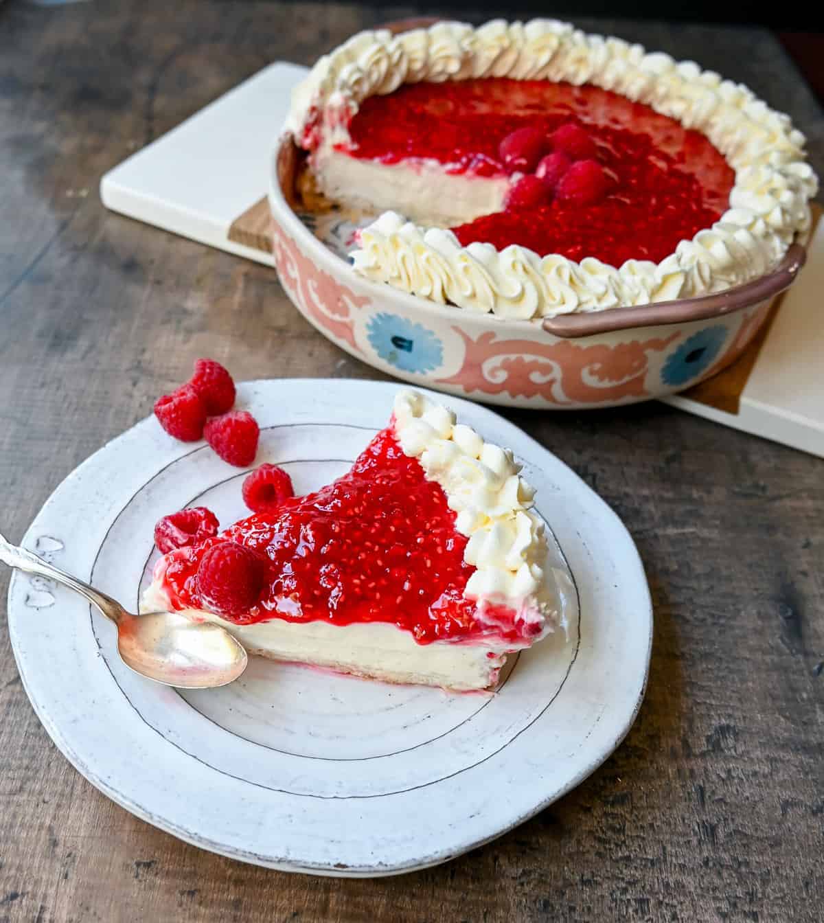 raspberry cream pie slice on a plate