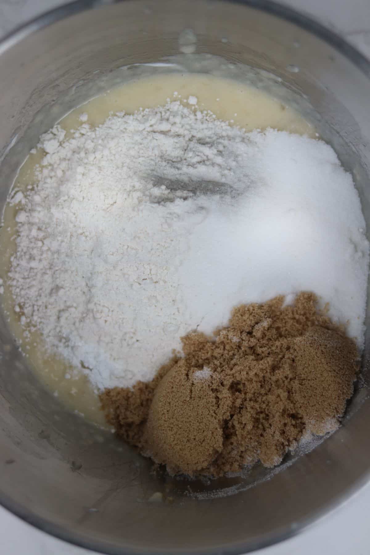 dry ingredients being added to wet ingredients