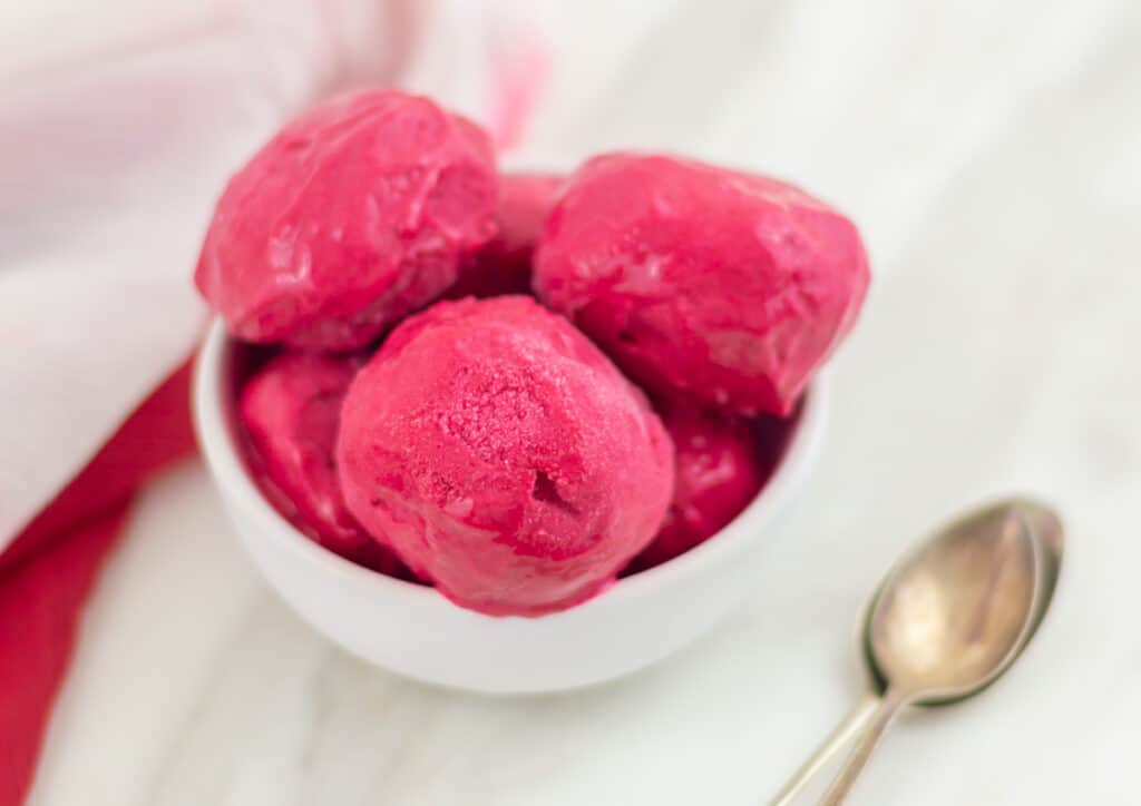 raspberry ice cream in a bowl