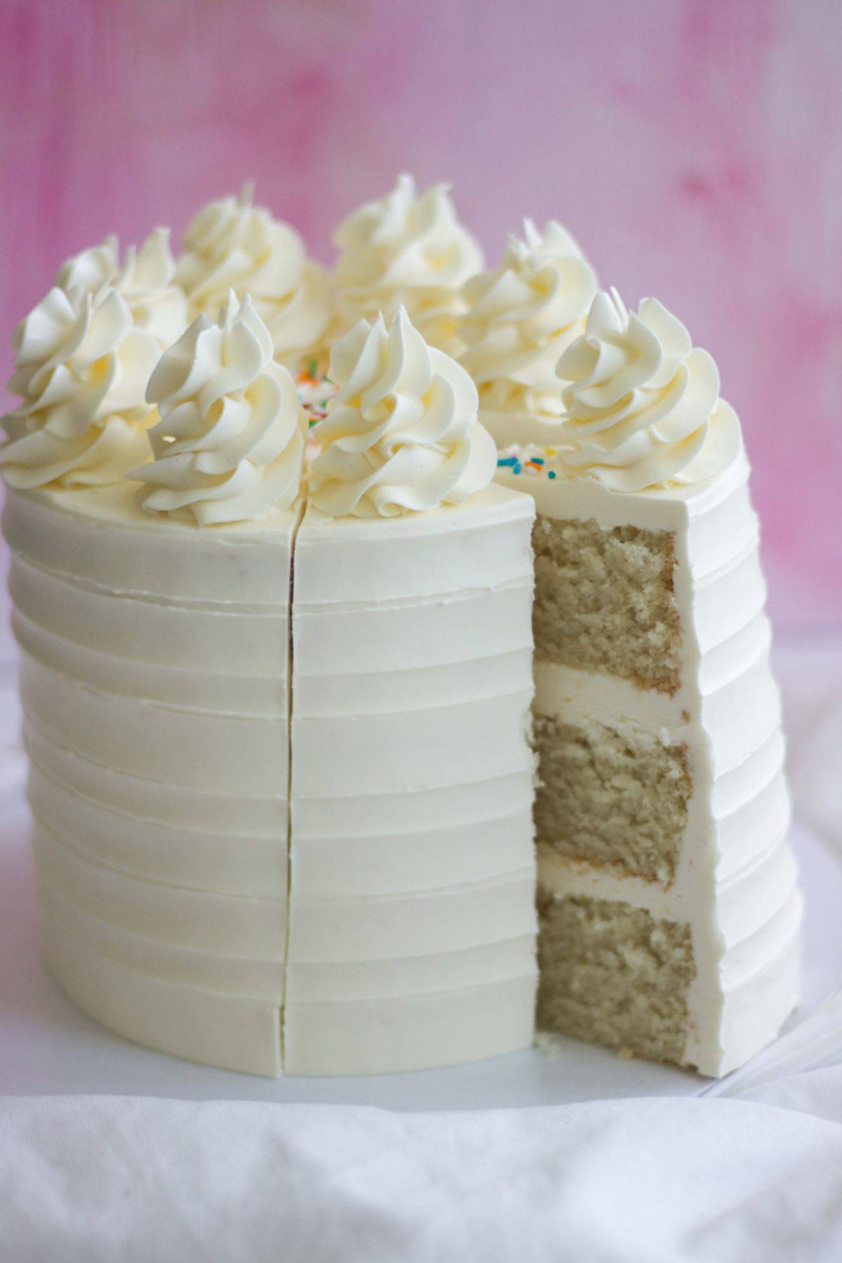 vanilla cake with a slice cut out