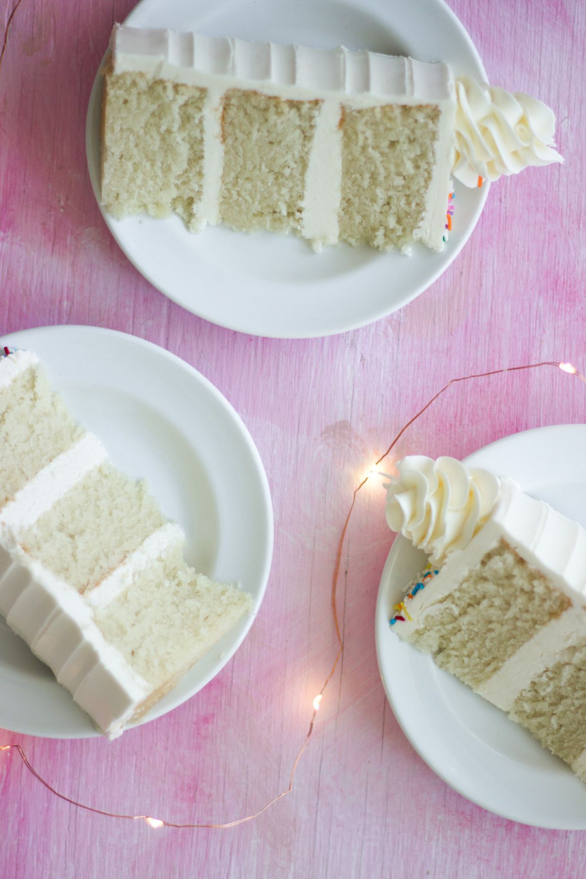 slices of vanilla cake on plates