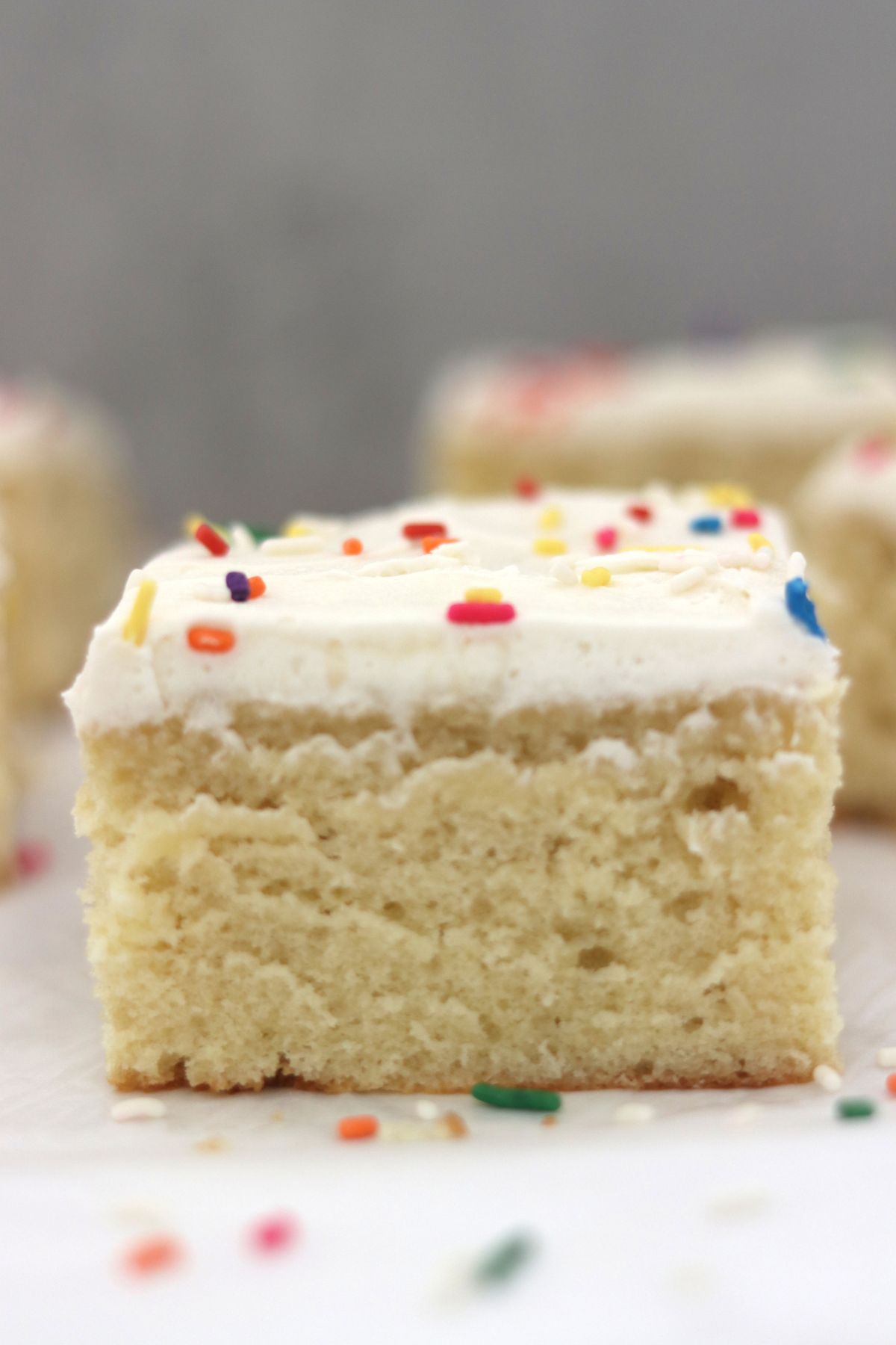 close up of a slice of vanilla sheet cake